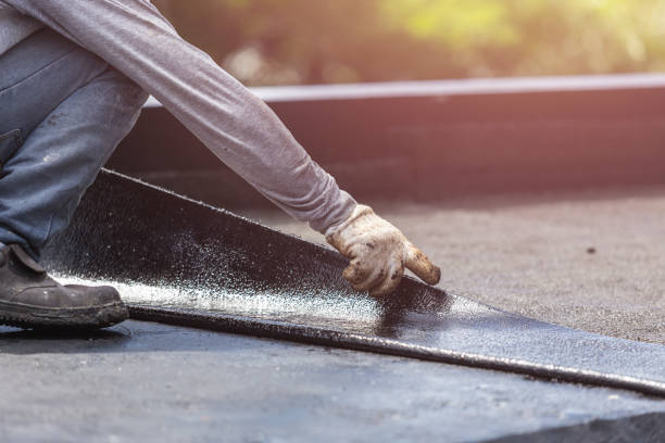 Professional Basement Waterproofing technician working in Ithaca, MI